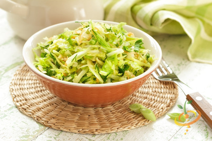 Bowl of fresh shredded cabbage salad made from Drumhead cabbage seeds