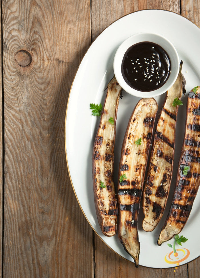 Long purple Italian eggplant (aubergine) from SeedsNow, fresh and ripe, with smooth shiny skin and elongated shape.
