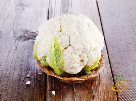 Fresh cauliflower from SeedsNow, showcasing a cluster of crisp, white cauliflower heads ready for harvesting.